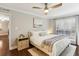 Beautiful bedroom with a ceiling fan, neutral walls, and a plush bed in a well-lit space at 2901 Lenox Rd # 1002, Atlanta, GA 30324