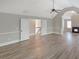 Large bedroom featuring vaulted ceilings, luxury vinyl plank flooring and a ceiling fan at 2897 Austin Common Dr, Dacula, GA 30019