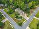 Aerial view of a home showcasing mature trees and landscaped front and back yards at 3278 Winter Wood Ct, Marietta, GA 30062