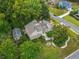 An aerial view shows a well-maintained home with mature trees, manicured landscaping, and a separate building at 3278 Winter Wood Ct, Marietta, GA 30062