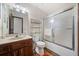 Bathroom featuring shower with glass doors, and vanity with tile countertop at 3278 Winter Wood Ct, Marietta, GA 30062