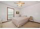 A simply decorated bedroom featuring a twin bed, side table, and a window at 3278 Winter Wood Ct, Marietta, GA 30062