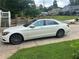 Sleek white car parked on the driveway, adding a touch of luxury at 3278 Winter Wood Ct, Marietta, GA 30062