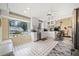 Spacious kitchen with stainless steel appliances, white cabinets, breakfast nook, and a garden view at 3278 Winter Wood Ct, Marietta, GA 30062