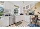Bright kitchen with stainless steel appliances, white cabinets and a view of the backyard at 3278 Winter Wood Ct, Marietta, GA 30062