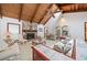 Inviting living room with a vaulted ceiling, skylight, and a stone fireplace at 3278 Winter Wood Ct, Marietta, GA 30062