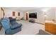 Large living room with a TV, comfortable seating, and a view of the backyard at 3278 Winter Wood Ct, Marietta, GA 30062
