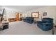 Spacious living room with comfortable seating, a desk, and ample lighting at 3278 Winter Wood Ct, Marietta, GA 30062