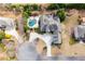 Backyard view of an upscale home and lot featuring a custom swimming pool and a patio at 2770 Wooded Hills Walk, Marietta, GA 30062
