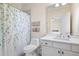 Clean white bathroom with a large mirror and shower at 2770 Wooded Hills Walk, Marietta, GA 30062