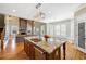Bright and spacious kitchen with a granite island, pantry, and hardwood flooring at 2770 Wooded Hills Walk, Marietta, GA 30062