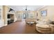 A Gathering room with a mounted marlin decoration, a beige sectional, and built in shelving at 2770 Wooded Hills Walk, Marietta, GA 30062