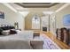 Spacious main bedroom featuring a fireplace, large windows, and a sitting area at 2770 Wooded Hills Walk, Marietta, GA 30062