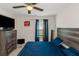 Bedroom with furniture including a TV and a window bringing in natural light at 294 Broder Farms Dr, Stockbridge, GA 30281