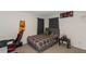 This cozy bedroom comes complete with basketball decor, perfect for the sports enthusiast at 294 Broder Farms Dr, Stockbridge, GA 30281