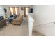 Spacious living room with comfortable seating and stairs at 294 Broder Farms Dr, Stockbridge, GA 30281
