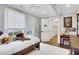 Bright bedroom with a large window, white carpet, football theme, and a view to the hallway at 11 Collier Nw Ln, Atlanta, GA 30305