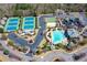Aerial view of community amenities, including tennis courts, playground, swimming pool and walking trails at 303 Dexter Dr, Woodstock, GA 30188