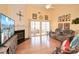 Comfortable living room with a fireplace, sliding doors to the back patio, and neutral colors at 303 Dexter Dr, Woodstock, GA 30188