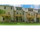 Backyard view of multi-level decks, and green grass at 320 Mahone Dr, Lilburn, GA 30047