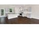 Modern kitchen featuring granite countertops, stainless steel appliances, and an island at 320 Mahone Dr, Lilburn, GA 30047