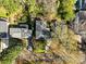 Aerial view of a home with a gray roof, surrounded by lush trees and greenery at 46 W Belle Isle Rd, Atlanta, GA 30342