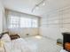Spacious room with white walls, tile floor, and built-in shelving at 46 W Belle Isle Rd, Atlanta, GA 30342