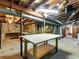 Unfinished basement featuring exposed ceiling, concrete floor, and workbench at 46 W Belle Isle Rd, Atlanta, GA 30342