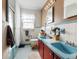 Unique bathroom featuring blue vanities and a shower at 46 W Belle Isle Rd, Atlanta, GA 30342