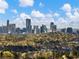 Beautiful city skyline view with lush greenery and trees at 46 W Belle Isle Rd, Atlanta, GA 30342