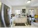 Spacious kitchen featuring modern stainless steel appliances and white cabinets at 46 W Belle Isle Rd, Atlanta, GA 30342