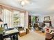 Bright living room featuring large windows and hardwood floors at 46 W Belle Isle Rd, Atlanta, GA 30342