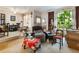 Cozy living room with natural light, vintage furniture, and hardwood floors at 46 W Belle Isle Rd, Atlanta, GA 30342