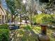 Lush yard showcasing mature trees and landscaping surrounding the property at 46 W Belle Isle Rd, Atlanta, GA 30342