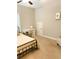 Bright bedroom features a white desk and a comfortable bed for relaxation at 5745 Pickens Garden Ln, Powder Springs, GA 30127