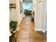 Hallway features hardwood floors and stylish decor at 5745 Pickens Garden Ln, Powder Springs, GA 30127
