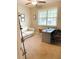 Comfortable home office space with natural light and neutral colors, perfect for working from home at 5745 Pickens Garden Ln, Powder Springs, GA 30127