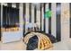 Chic bedroom featuring black and white striped walls, a plush bed, and stylish decor for a luxurious retreat at 548 Fletcher St, Atlanta, GA 30310