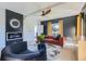 Elegant living room showcasing a fireplace, comfortable seating, stylish decor, and plenty of natural light at 548 Fletcher St, Atlanta, GA 30310