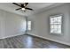Hardwood floors, neutral walls, and ample natural light create a serene bedroom space at 73 Atlanta Sw Ave, Atlanta, GA 30315