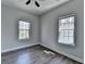 Bedroom featuring hardwood floors, natural light, and neutral walls creating a welcoming ambiance at 73 Atlanta Sw Ave, Atlanta, GA 30315