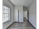 Bedroom with hardwood floors, window, and closet offers natural light and ample storage space at 73 Atlanta Sw Ave, Atlanta, GA 30315
