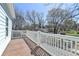 Wooden deck with white railing provides outdoor space and views of the surrounding neighborhood at 73 Atlanta Sw Ave, Atlanta, GA 30315