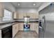 Cozy kitchen features stainless steel appliances and tiled floors for a modern, easy-to-clean space at 73 Atlanta Sw Ave, Atlanta, GA 30315