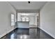 Bright living room featuring hardwood floors, an open layout and views of the outdoors at 73 Atlanta Sw Ave, Atlanta, GA 30315
