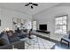 Cozy living room area with modern furniture, decor, and natural light from the windows at 73 Atlanta Sw Ave, Atlanta, GA 30315