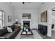 Comfortable living room featuring a decorative fireplace, sleek furniture, and stylish accents at 73 Atlanta Sw Ave, Atlanta, GA 30315