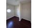 Walk-in closet showcasing hardwood floors and wire shelving at 7563 Avalon Blvd # 305, Fairburn, GA 30213