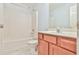 Bathroom featuring a combined tub and shower, providing a functional and clean space at 1526 Viero Dr, Lawrenceville, GA 30044