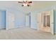 Spacious bedroom with carpet, including access to walk-in closet and other rooms at 1526 Viero Dr, Lawrenceville, GA 30044